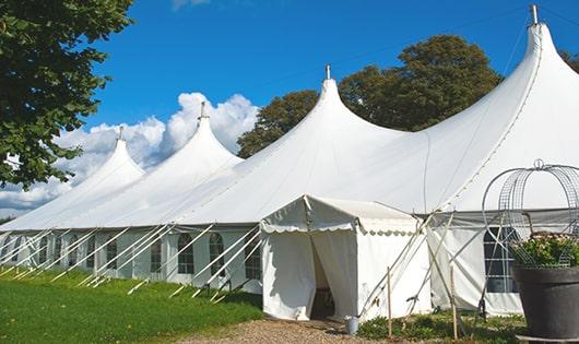 multiple portable restrooms in a row for added convenience at a concert venue in Dunellen, NJ